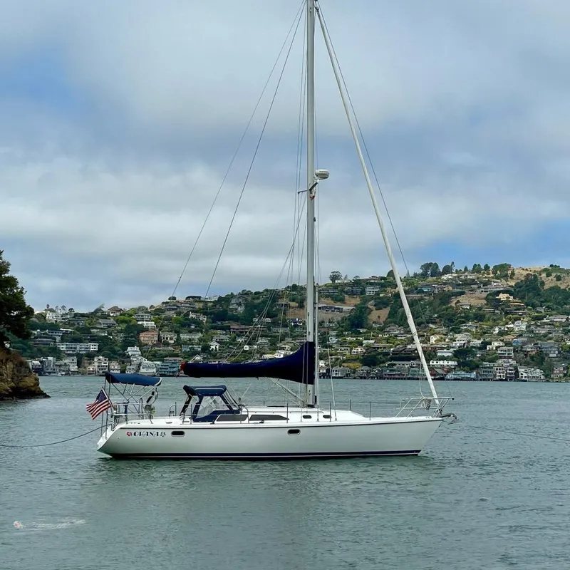 Slide: The Image of Catalina 36 MkII sailboat anchored in scenic bay, 2004 model. - 1