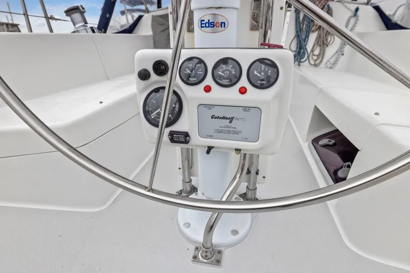 Slide: The Image of Steering console of 2004 Catalina 36 MkII sailboat with gauges and controls. - 33