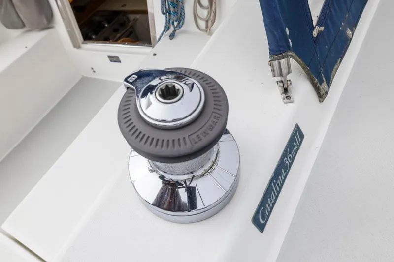 Slide: The Image of Winch on 2004 Catalina 36 MkII sailboat deck, with visible cabin entrance. - 38