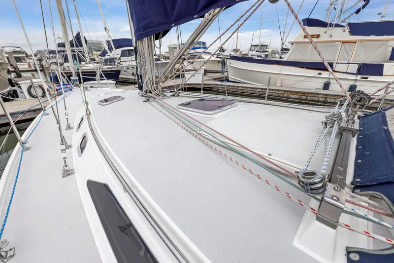 Slide: The Image of 2004 Catalina 36 MkII sailboat deck with rigging at marina. - 39