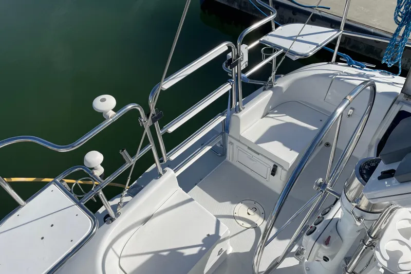 Slide: The Image of Cockpit of a 2004 Catalina 36 MkII sailboat with steering wheel and seating. - 47