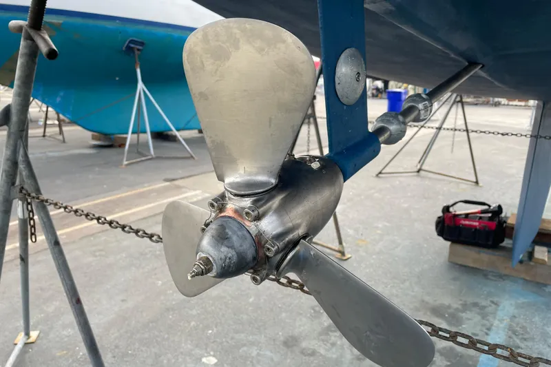 Slide: The Image of Propeller of a 2004 Catalina 36 MkII sailboat on a stand in a boatyard. - 51