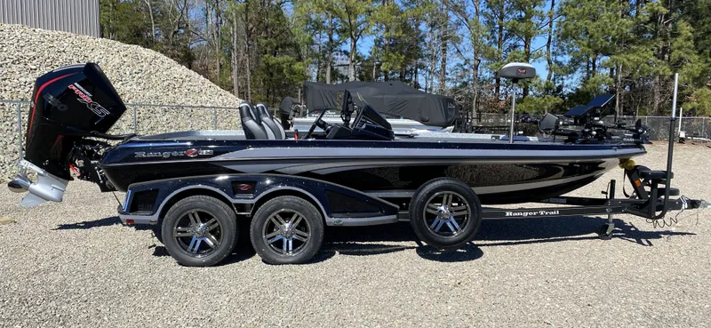 The Image of 2025 Ranger Z520R boat parked outdoors on a trailer. - 1