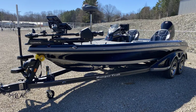 Slide: The Image of 2025 Ranger Z520R boat parked on trailer outdoors. - 8