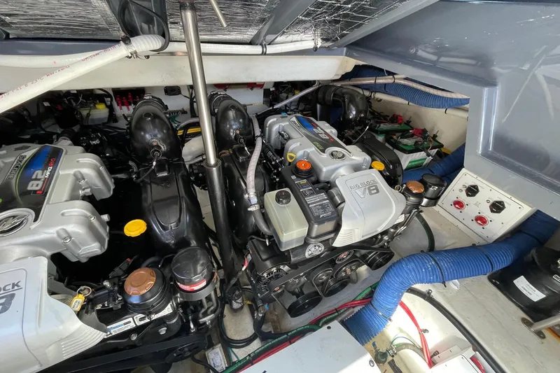 Slide: The Image of Engine compartment of 2023 Cruisers Yachts 38 GLS I/O, featuring dual V8 engines. - 18