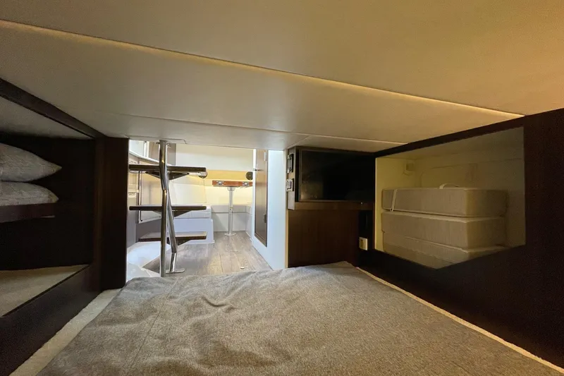 Slide: The Image of Interior cabin of 2023 Cruisers Yachts 38 GLS I/O with modern design and cozy sleeping area. - 21