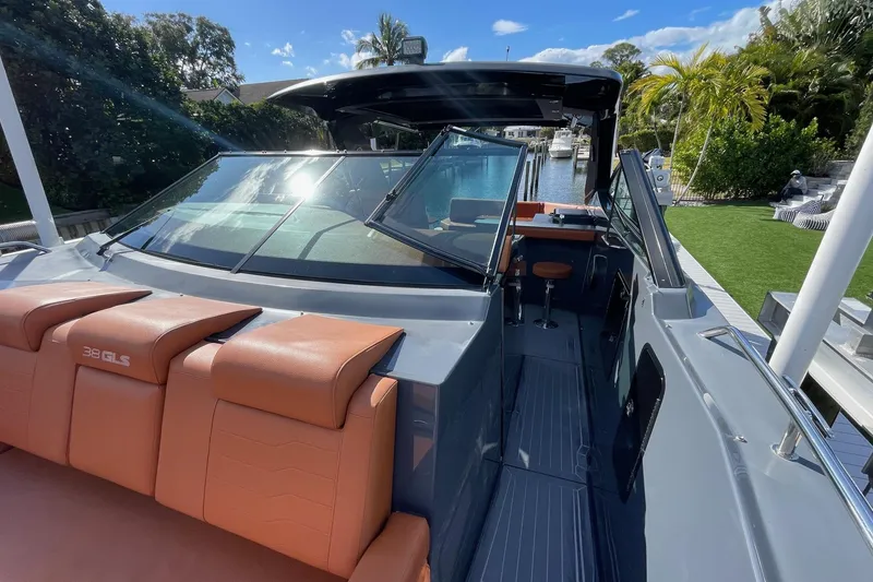 Slide: The Image of 2023 Cruisers Yachts 38 GLS I/O boat with sleek design and luxurious seating. - 35