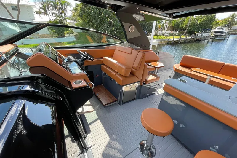 Slide: The Image of 2023 Cruisers Yachts 38 GLS I/O interior with luxurious seating and modern helm. - 43