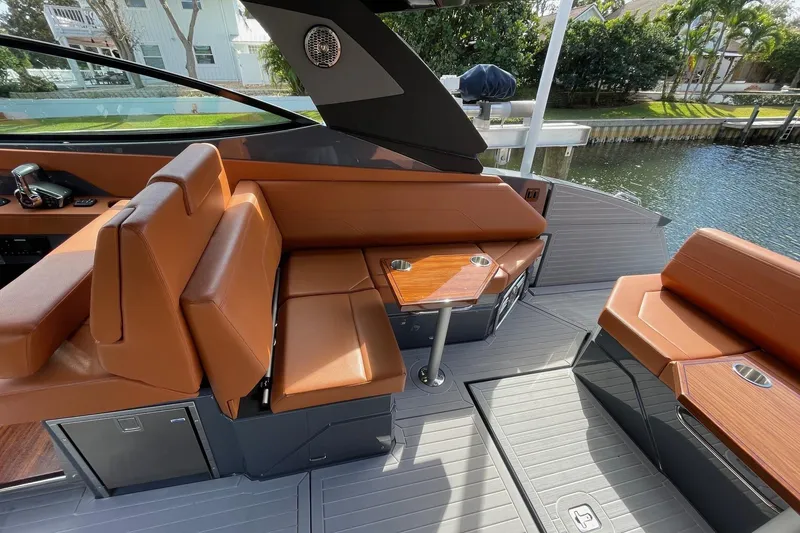 Slide: The Image of 2023 Cruisers Yachts 38 GLS I/O interior with luxurious seating and sleek design. - 48
