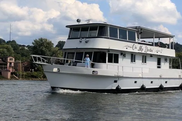 The Image of 1987 Kelly motor yacht "Oh No Dario" cruising on a scenic river. - 0