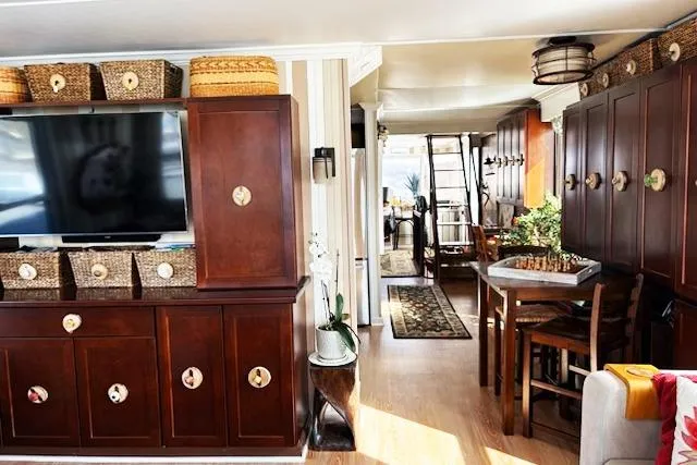 Slide: The Image of Luxurious interior of 1987 Kelly motor yacht with wooden cabinets and modern decor. - 20