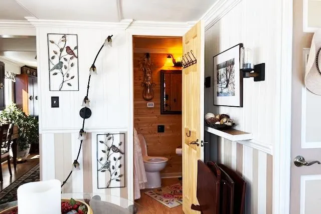 Slide: The Image of Interior of a 1987 Kelly motor yacht with cozy decor and bathroom view. - 44