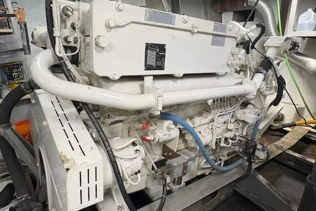 Slide: The Image of Engine of 1987 Kelly motor yacht, detailed view of mechanical components. - 46