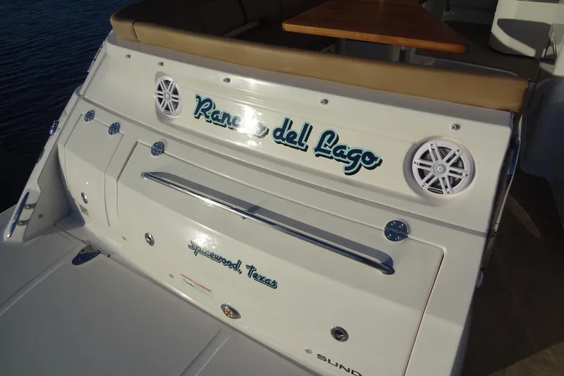 Slide: The Image of 2017 Sea Ray Sundancer 350 boat with custom name and speakers on the stern. - 16