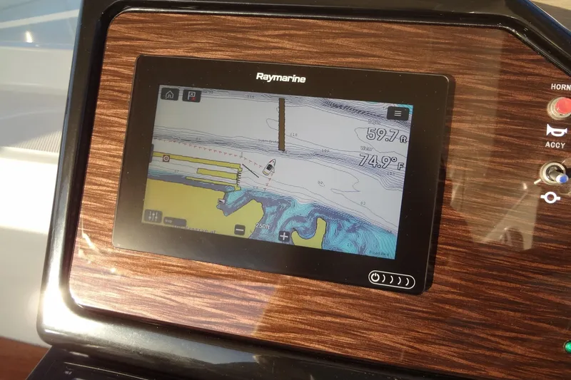 Slide: The Image of Raymarine navigation display on 2017 Sea Ray Sundancer 350, showing depth and water temperature. - 27