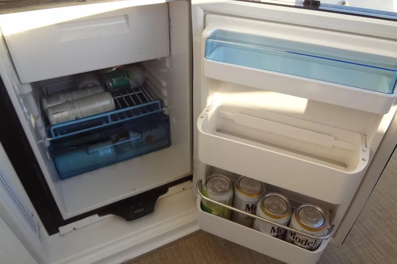 Slide: The Image of Mini fridge stocked with beverages on a 2017 Sea Ray Sundancer 350 yacht. - 33