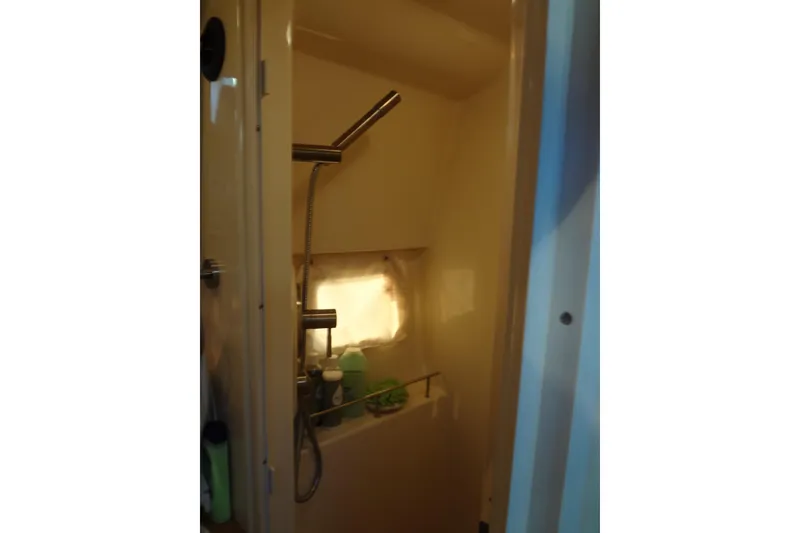 Slide: The Image of 2017 Sea Ray Sundancer 350 bathroom with shower and toiletries. - 51