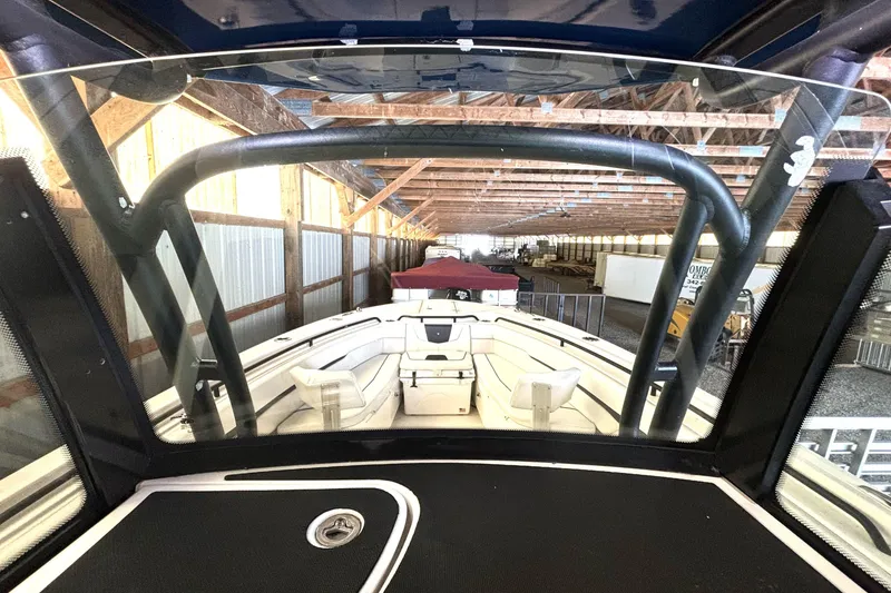 Slide: The Image of 2019 Wellcraft 302 Fisherman boat interior view in storage facility. - 29