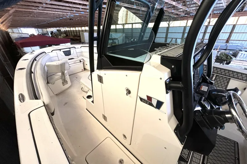 Slide: The Image of 2019 Wellcraft 302 Fisherman boat interior in a storage facility. - 38