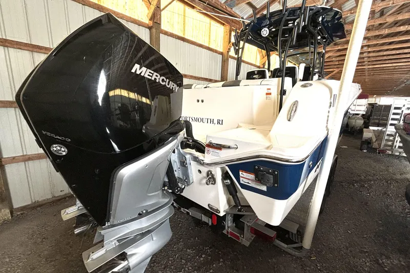 Slide: The Image of 2019 Wellcraft 302 Fisherman boat with Mercury Verado engine in a storage facility. - 5