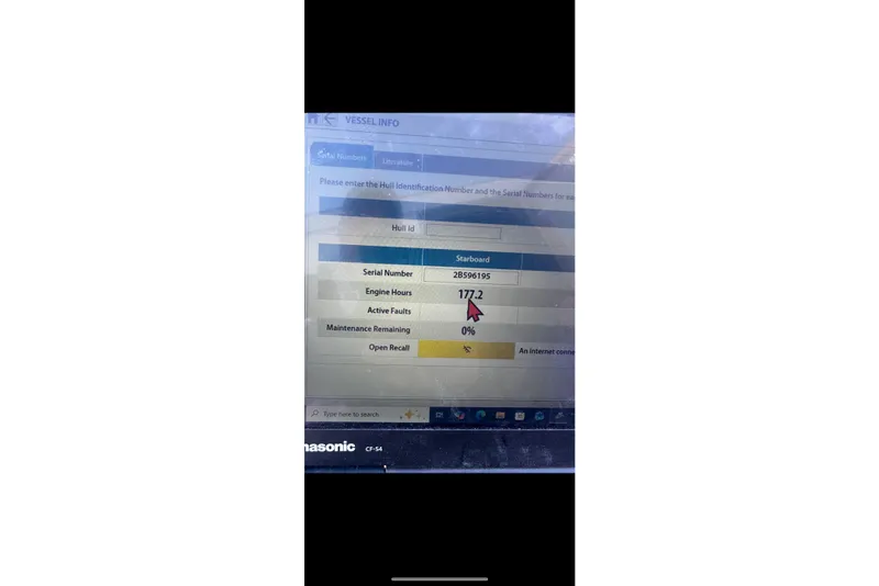 Slide: The Image of Vessel info screen showing engine hours and serial number for 2018 Lowe Retreat 250 RFL. - 13
