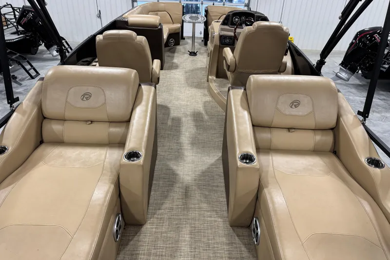 Slide: The Image of 2018 Lowe Retreat 250 RFL interior with luxurious beige seating and modern design. - 9