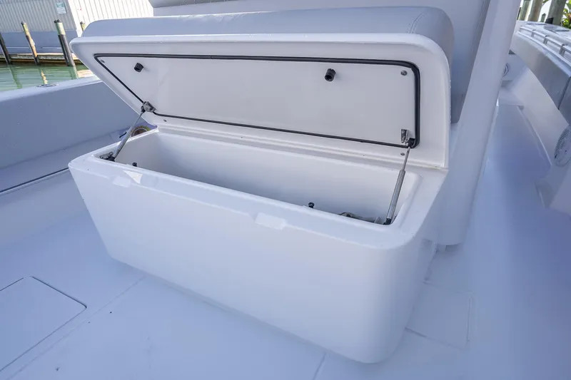 Slide: The Image of Open storage compartment on 2026 Contender 35 ST boat, showcasing spacious interior. - 23