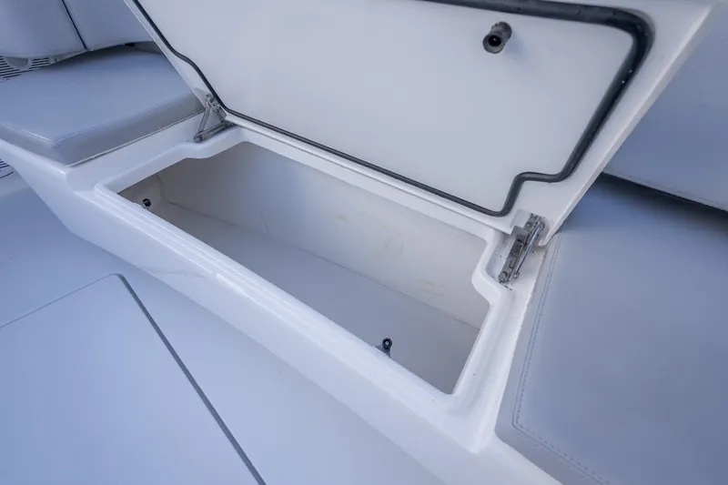 Slide: The Image of Open storage compartment on 2026 Contender 35 ST boat, showcasing interior space. - 42