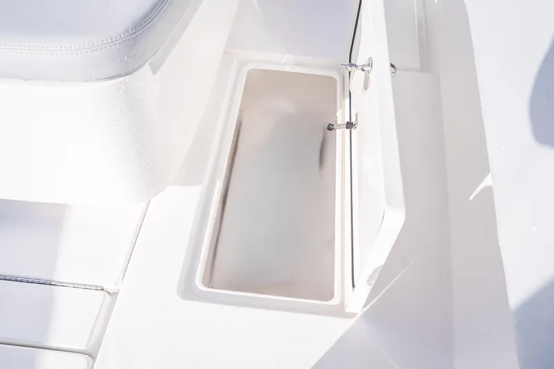 Slide: The Image of Open storage compartment on 2026 Contender 35 ST boat deck. - 44