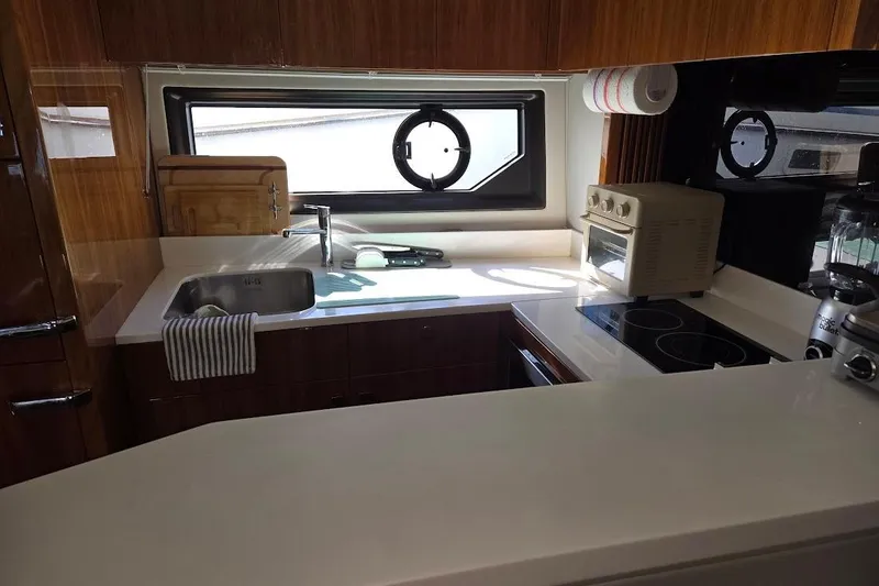 Slide: The Image of Luxurious kitchen interior of 2019 Sunseeker Predator 50 yacht with modern appliances. - 30