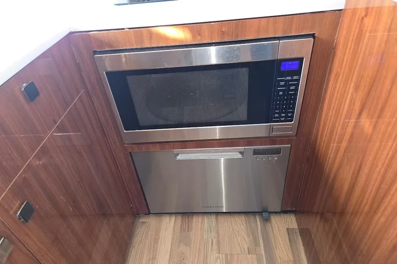 Slide: The Image of Modern kitchen appliances in 2019 Sunseeker Predator 50 yacht interior. - 32