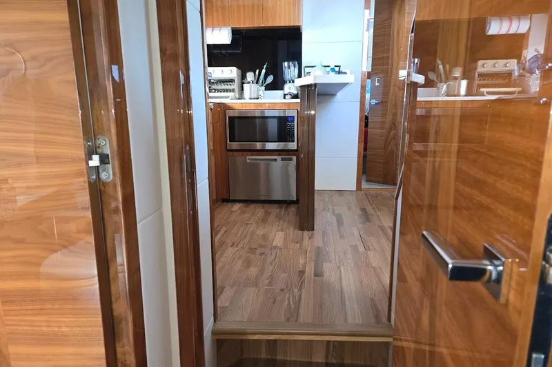 Slide: The Image of Luxurious interior of 2019 Sunseeker Predator 50 yacht kitchen area. - 40