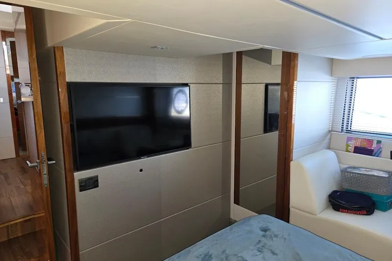Slide: The Image of Interior of 2019 Sunseeker Predator 50 yacht with TV and seating area. - 42