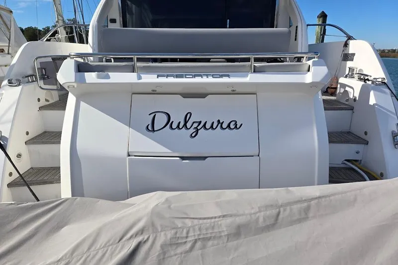Slide: The Image of 2019 Sunseeker Predator 50 yacht rear view with "Dulzura" name displayed. - 53