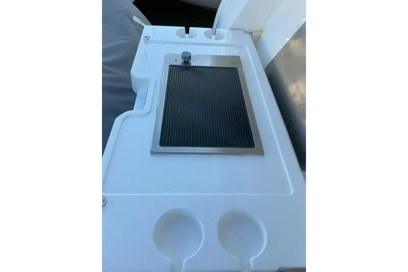 Slide: The Image of 2019 Sunseeker Predator 50 yacht grill and cup holders on deck. - 54