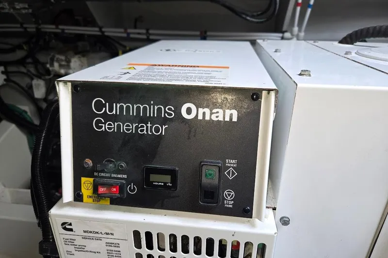 Slide: The Image of Cummins Onan generator in 2019 Sunseeker Predator 50 yacht engine room. - 74