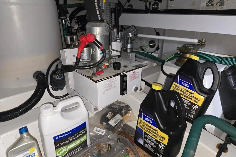Slide: The Image of Engine room of 2019 Sunseeker Predator 50 with coolant and antifreeze containers. - 81