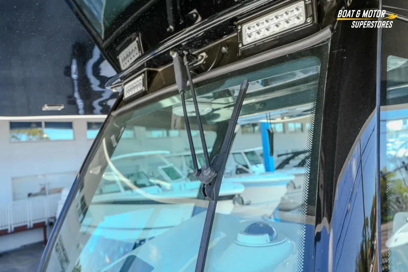 Slide: The Image of Storage compartment on 2023 HCB 39 Speciale boat with mesh bag and latch. - 102