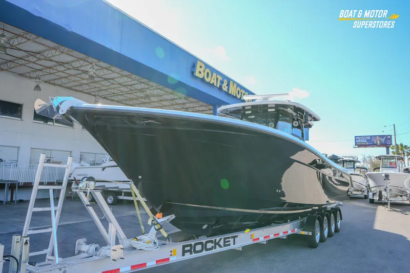 Slide: The Image of 2023 HCB 39 Speciale boat interior with seating and rod holders. - 16