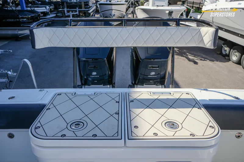 Slide: The Image of 2023 HCB 39 Speciale boat seating with diamond-stitched upholstery and cup holders. - 29