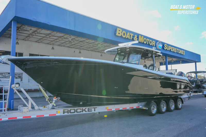 Slide: The Image of 2023 HCB 39 Speciale boat on trailer at Boat & Motor Superstores. - 3