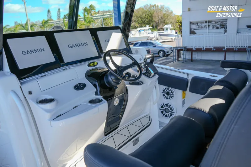 Slide: The Image of 2023 HCB 39 Speciale boat dashboard featuring Mercury equipment. - 38