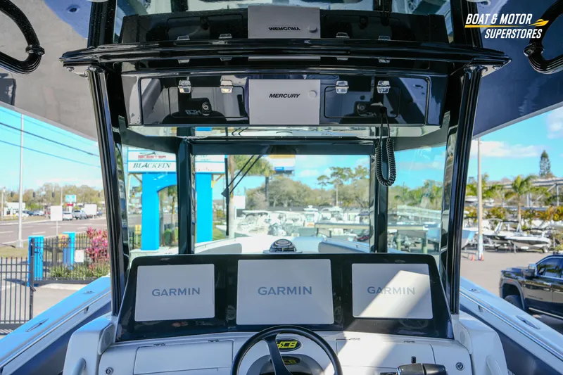 Slide: The Image of 2023 HCB 39 Speciale boat interior with logo and sleek design details. - 42