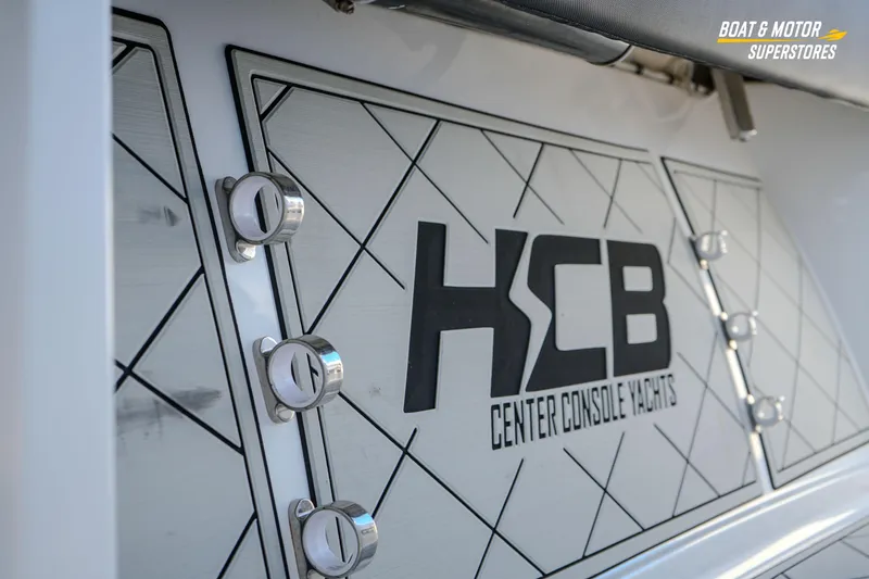 Slide: The Image of 2023 HCB 39 Speciale boat interior with speakers and cushioned seating. - 48