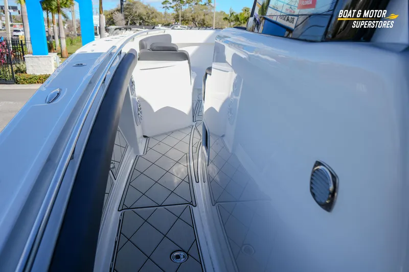 Slide: The Image of Bow view of 2023 HCB 39 Speciale boat at dealership, showcasing anchor and deck. - 49