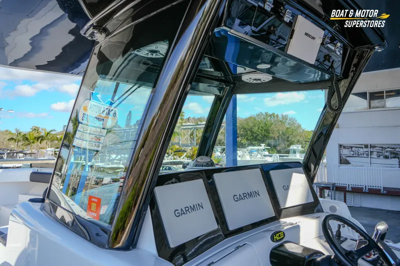 Slide: The Image of 2023 HCB 39 Speciale boat interior with diamond-patterned seating and flooring. - 50