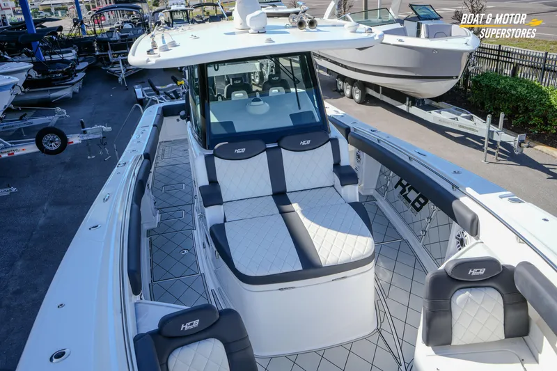 Slide: The Image of 2023 HCB 39 Speciale boat at dealership, showcasing sleek design and modern features. - 58