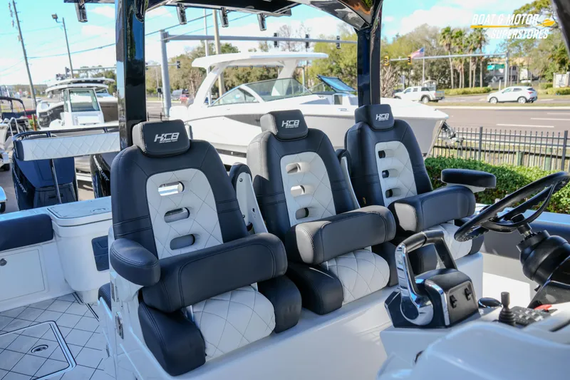 Slide: The Image of 2023 HCB 39 Speciale boat door detail with chrome handle, showcased at Boat & Motor Superstores. - 66