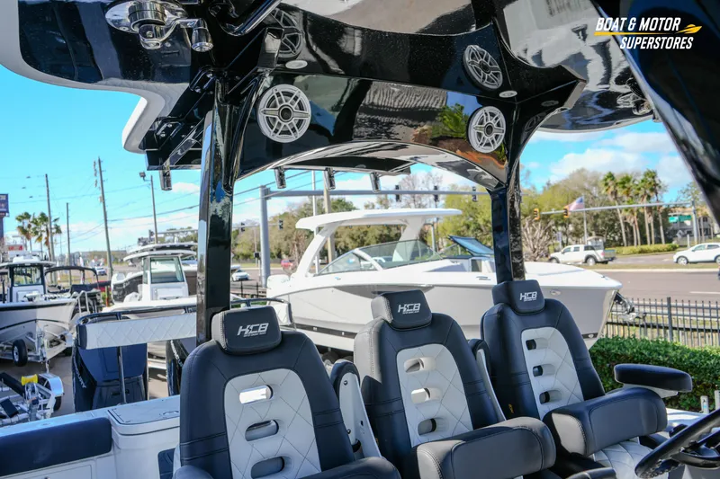 Slide: The Image of 2023 HCB 39 Speciale boat on trailer under clear blue sky. - 68
