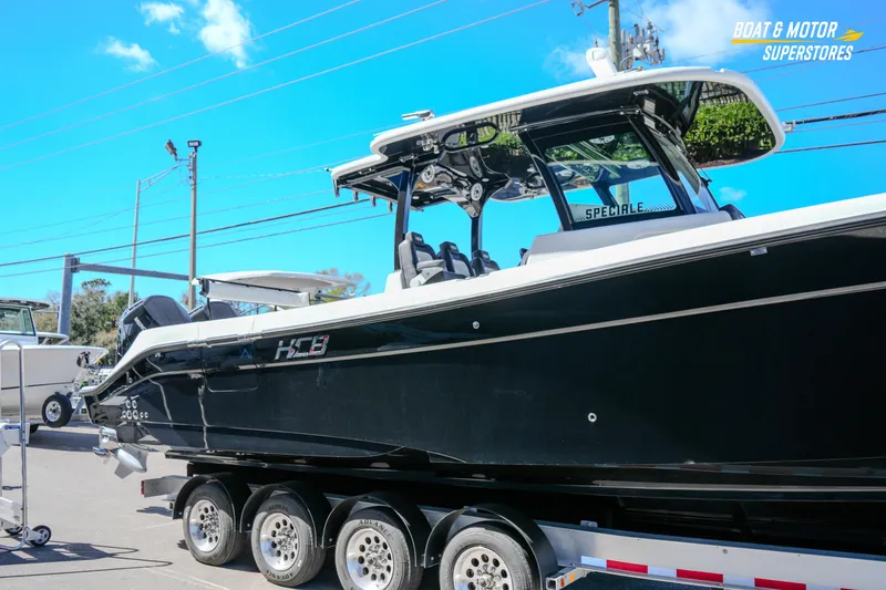 Slide: The Image of 2023 HCB 39 Speciale boat on trailer at dealership, side view. - 73